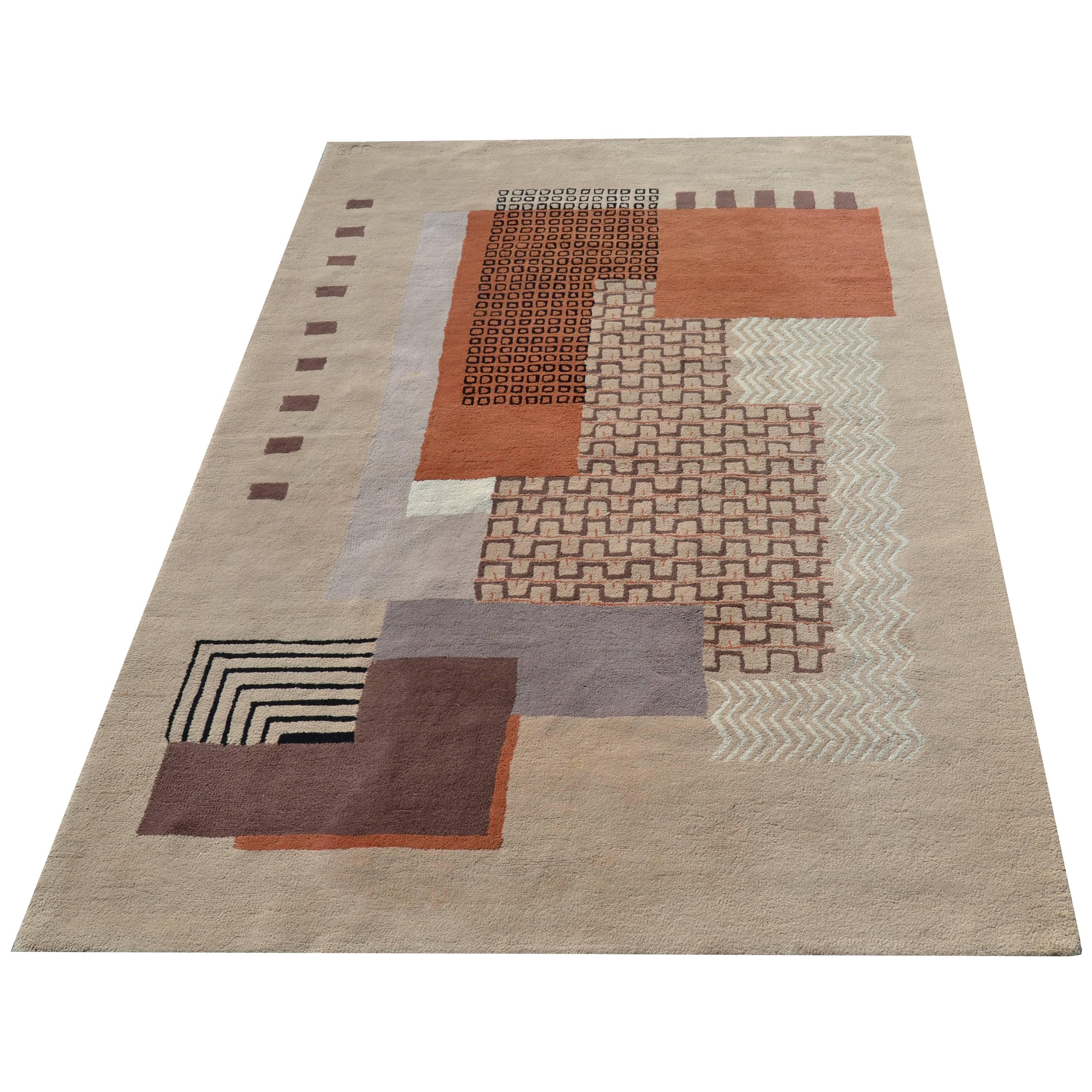 Exquisite Mid-Century Modern Handmade Artisan carpet, rug. 
Wool knotted carpet in a geometric patterned design featuring color blocking, square overlays, wave patterns, reminiscent of the Digital Age. Patterns and color combinations that are still