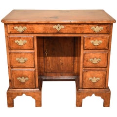 George I Walnut and Feather Banded Kneehole Desk
