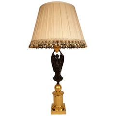 Figurale Lampe aus vergoldeter und patinierter Bronze im französischen Empire-Stil von Chibout