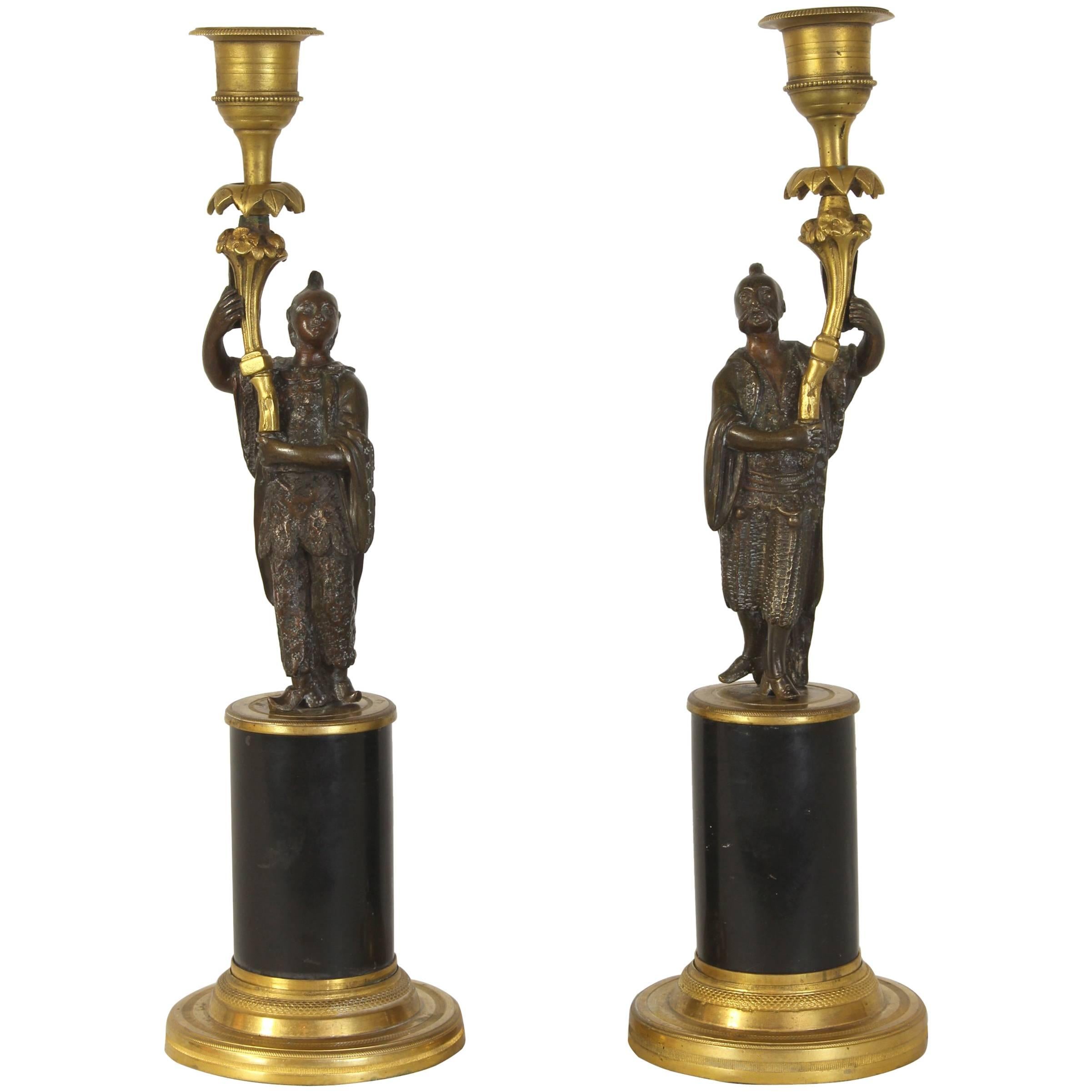 Pair of Early 19th Century Chinoiserie Figural Candlesticks For Sale