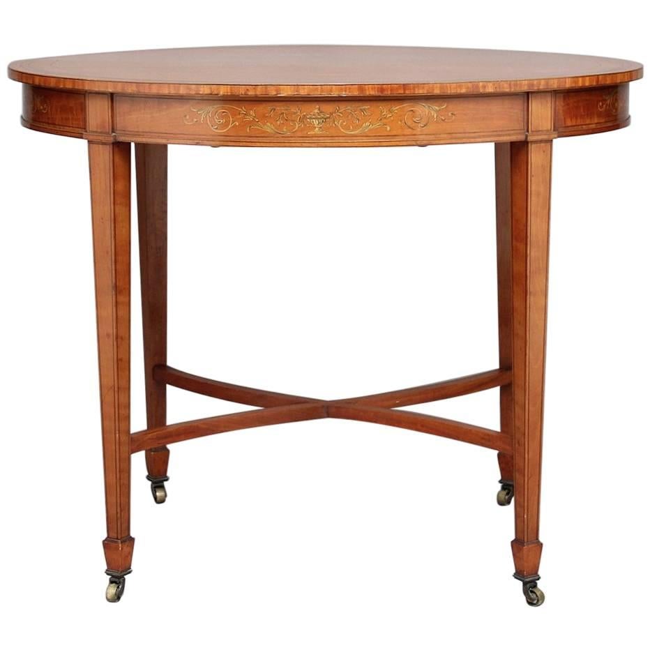 Table centrale en bois de satin du XIXe siècle