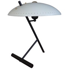 Lampe de table ou de bureau Louis Kalff de style moderne du milieu du siècle dernier, avec base noire et abat-jour gris