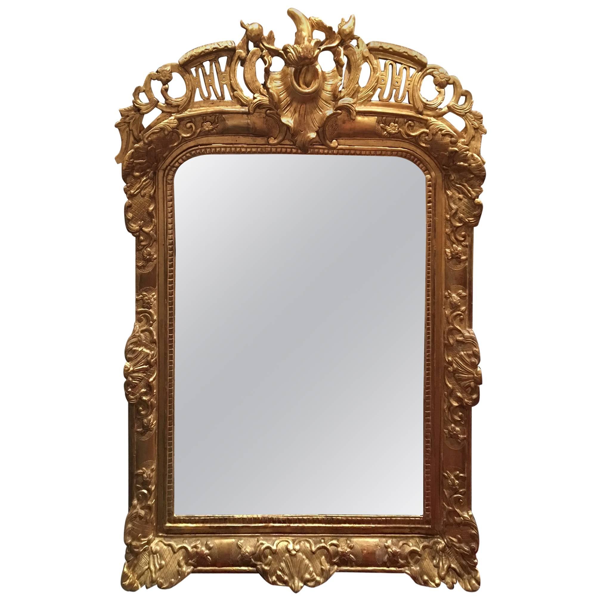 Miroir à trumeau en bois doré de style Louis XV, début du 19ème siècle