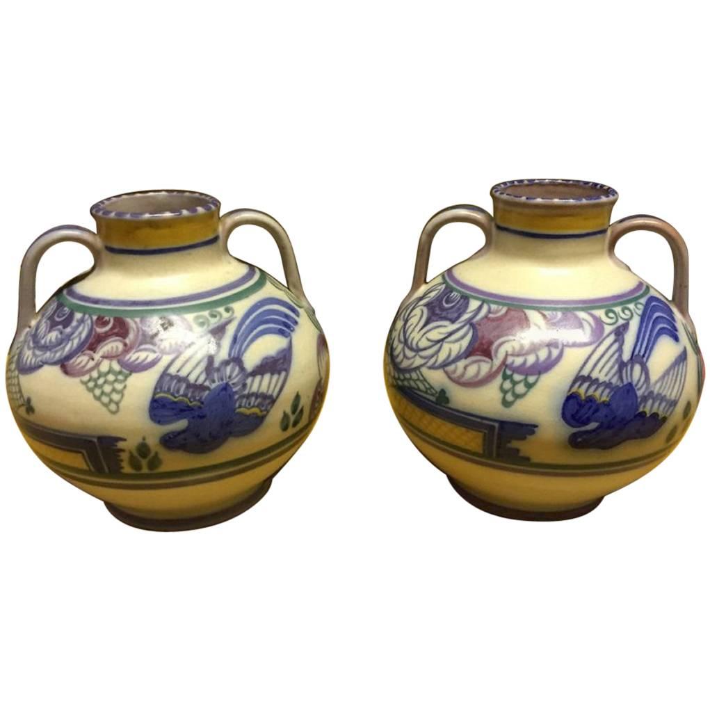 Poole Pottery, a Pair of Vases with Prancing Deer & Colorful Floral Backgrounds
