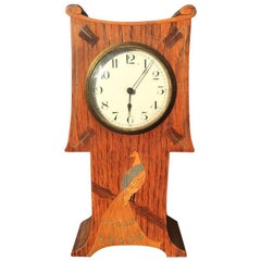 Antique Guild of Handicraft Attri, Arts & Crafts Oak Mantel Clock with Inlaid Peacock