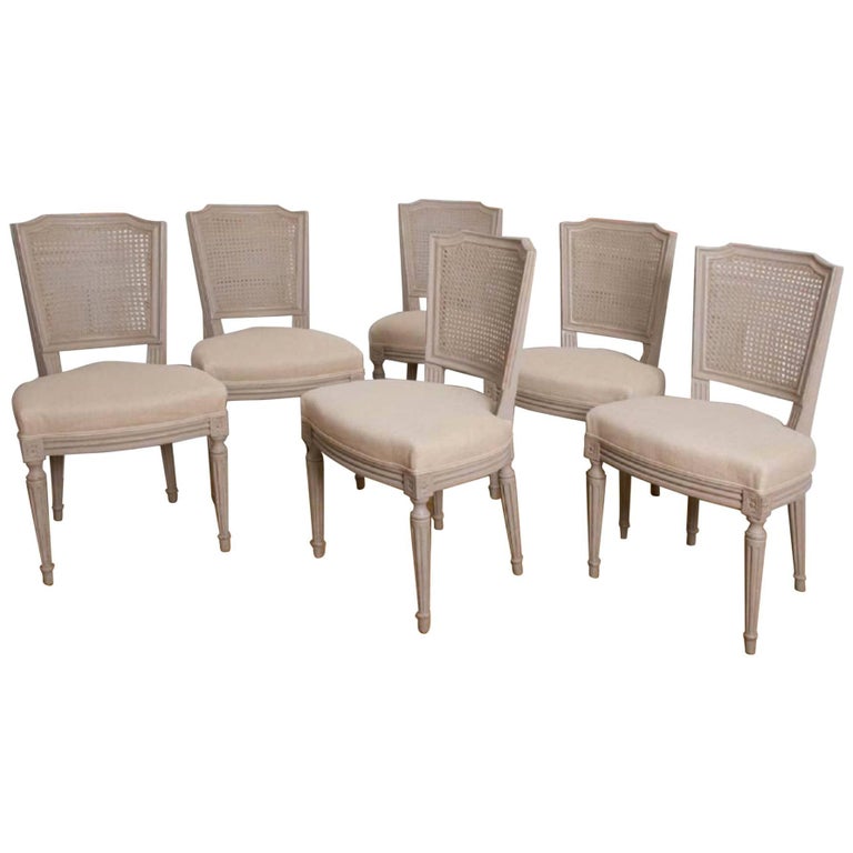 19th Century French Hand Carved Dining Chairs with Cane Backs, circa