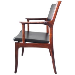 Erik Buch Sculpted Rosewood Armchair for Ørum Møbelfabrik, Denmark, 1958