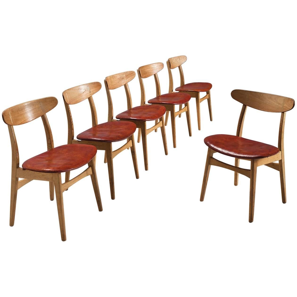 Hans J. Wegner Set of Six Dining Chairs with Original Red Leather
