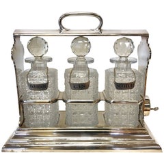Antique Sheffield Silver and Crystal Three Bottle Tantalus Set