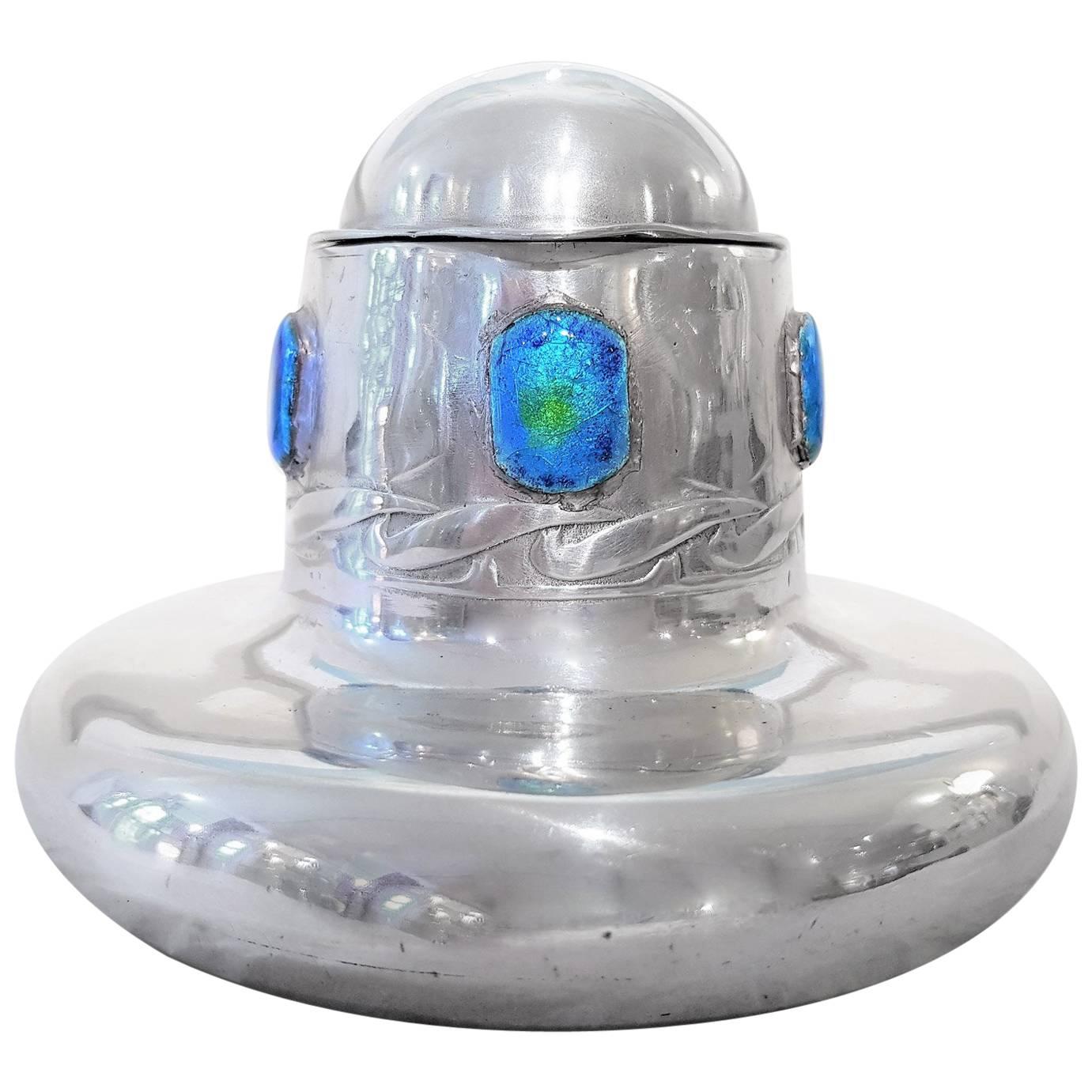 Archibald Knox for Liberty: a 
Tudric
 Pewter Inkwell with Enamel Decoration