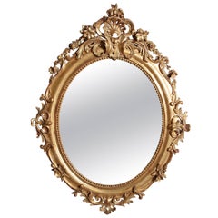 French 19th Century Carved and Gilt Beautiful Louis XV Oval Mirror