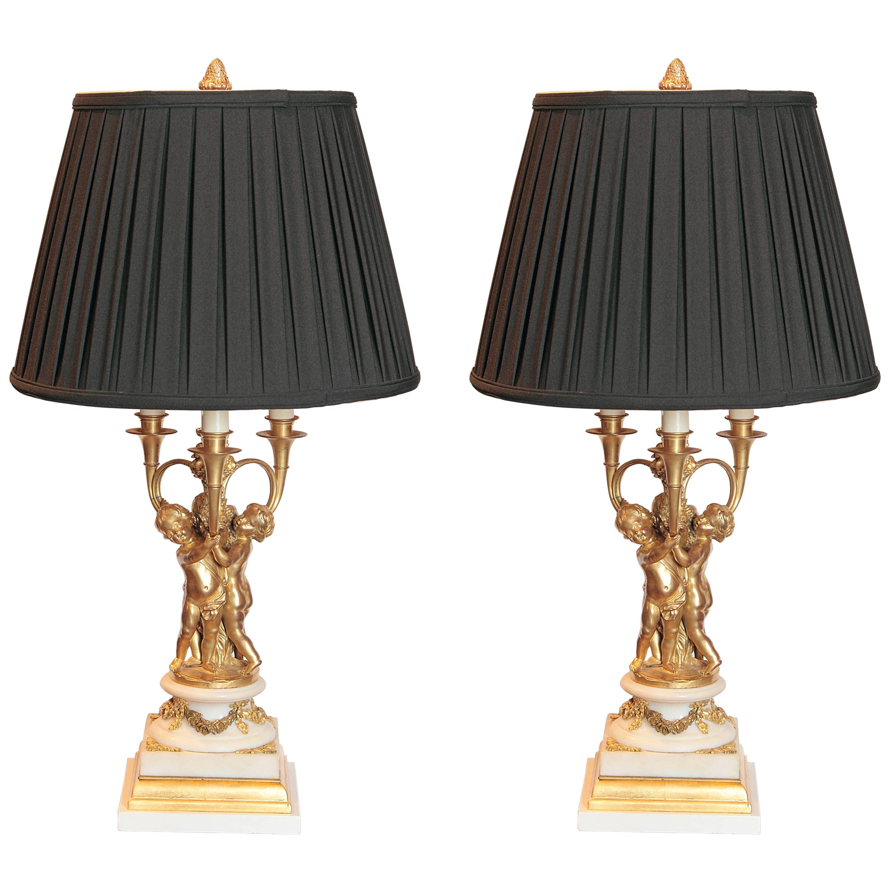 Pair of 19th Century French Gilt Bronze and Marble Based Cherub Lamps