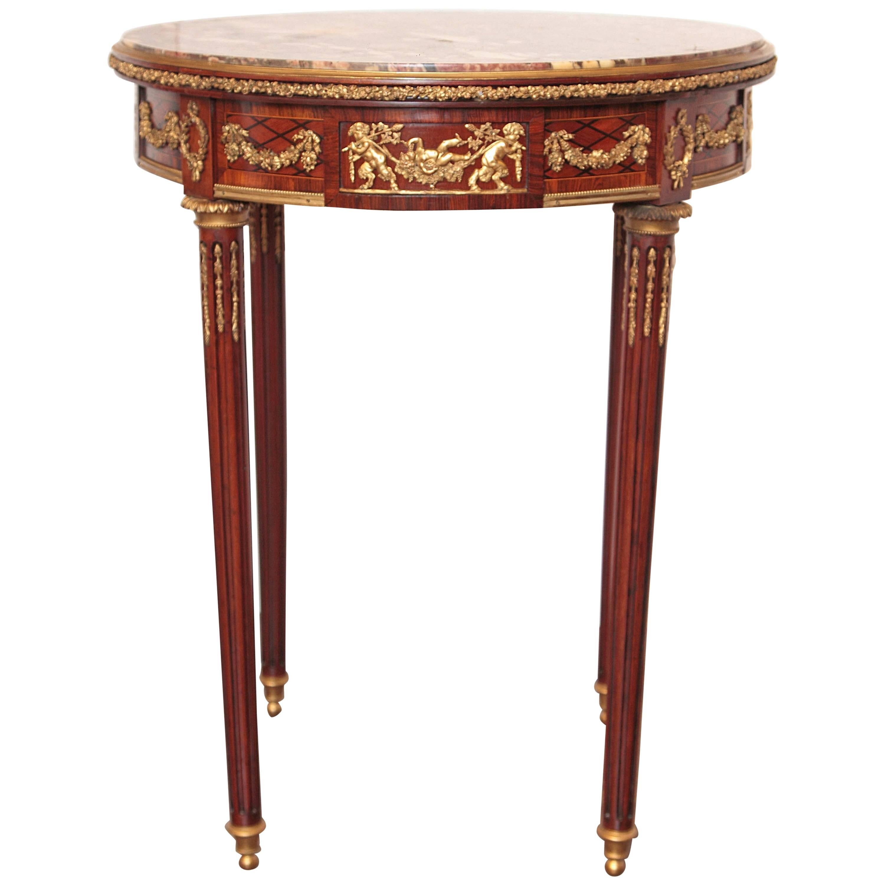 Französischer Gueridon-Tisch aus Mahagoni und vergoldeter Bronze mit Marmorplatte aus dem 19. Jahrhundert