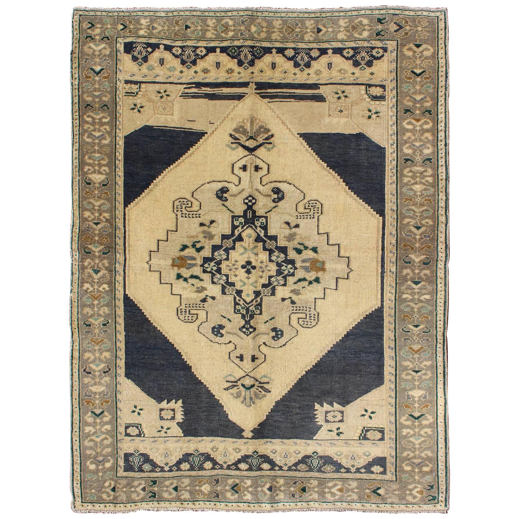 Vintage Turkish Oushak Rug with Stylized Medallion in Midnight Blue and Cream For Sale