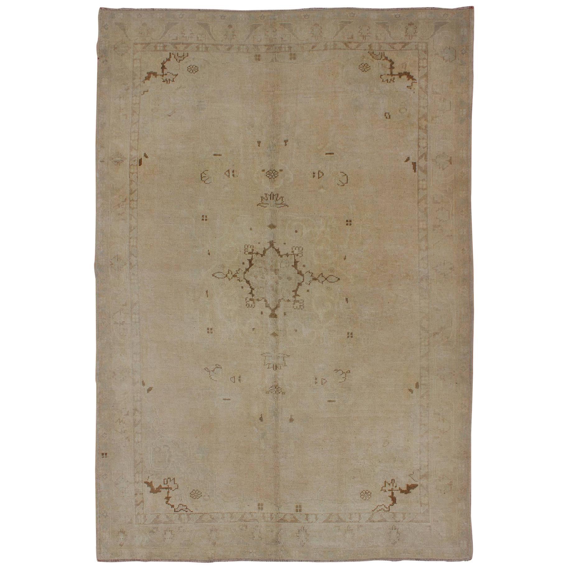 Midcentury Vintage Turkish Oushak Rug with Stylized Floral Design in Cream For Sale