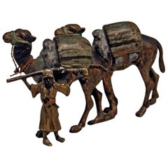 Vienna Bergman'n' Bronze En Miniature Arab Man Guiding Camels, circa 1900