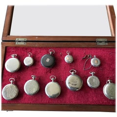 Antique Collection of 11 Silver and Gold 19th Century Watches in a Glas and Wood Display