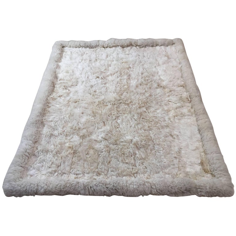 White sheepskin rug, 1950, offered by Mosaik