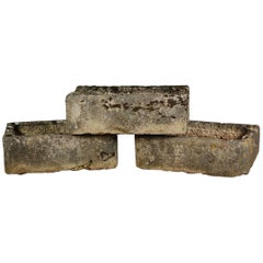 Collection of Three Early 19th Century French Hewn Limestone Planters