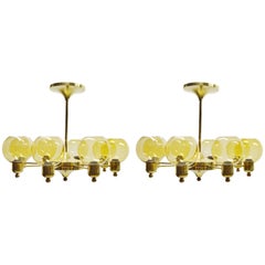 Large Pair of Brass Chandeliers of Unknown Design, circa 1960