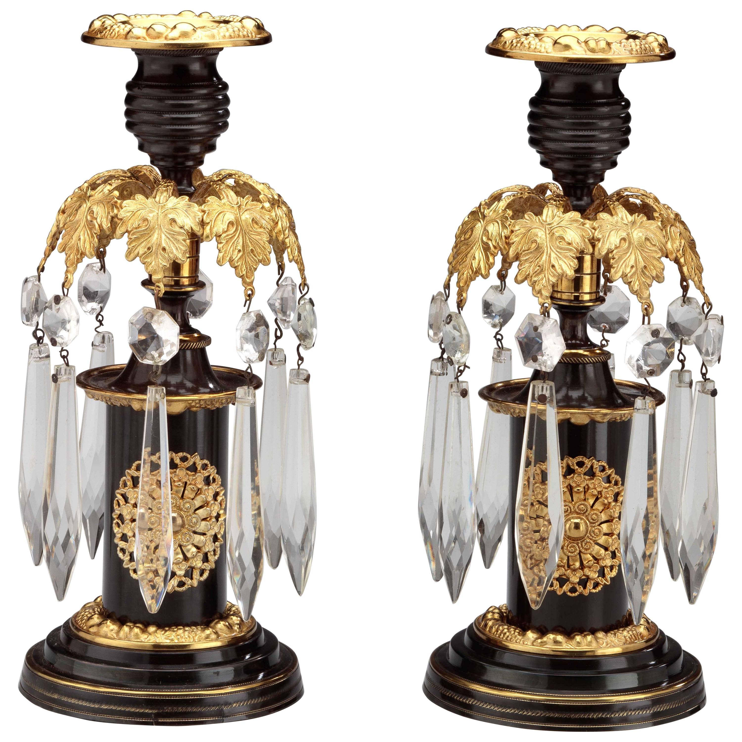Pair of Regency Lacquered Brass Candlesticks For Sale