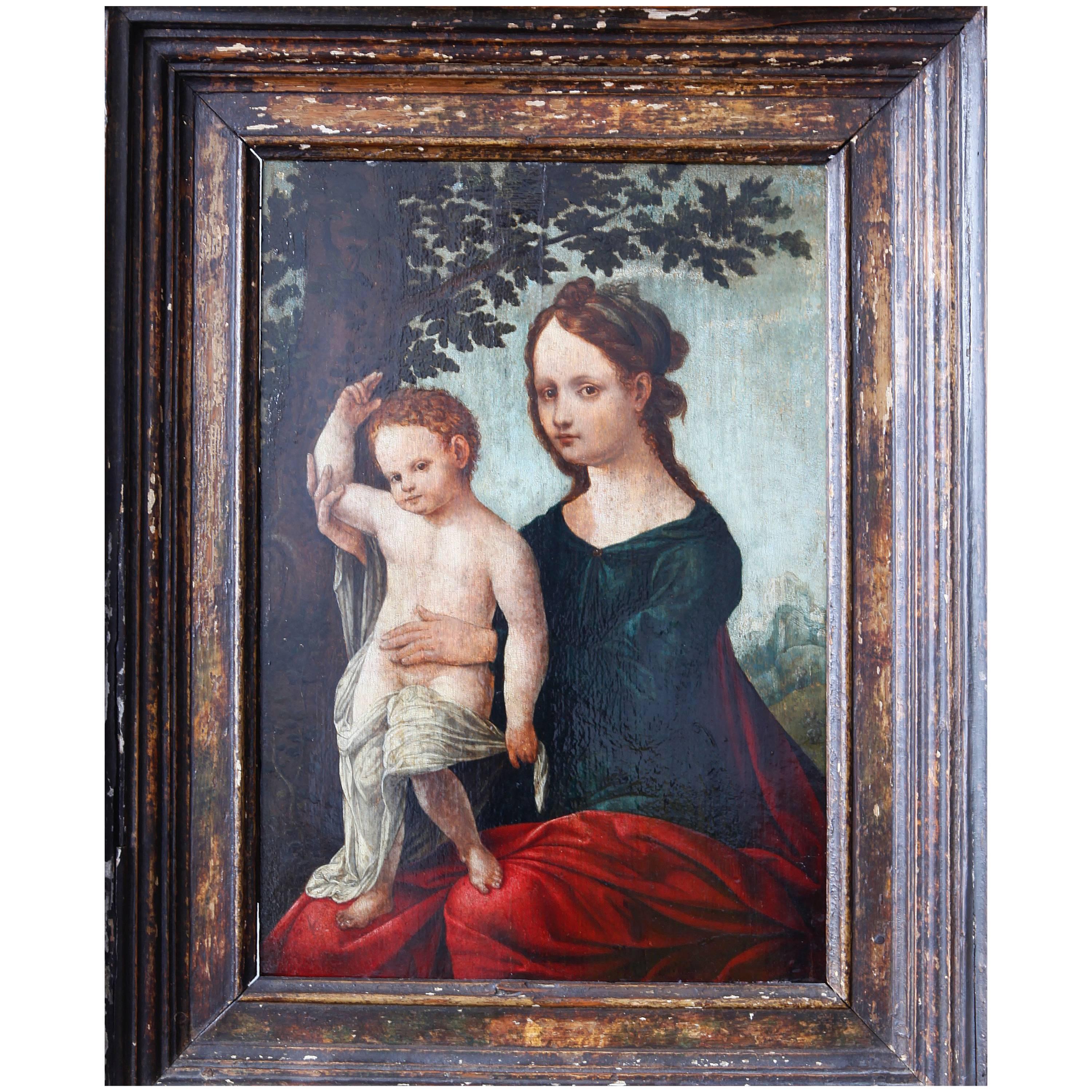 16th Century Netherlandish School Madonna and Child in a Landscape For Sale