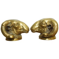 Pair of Patinated Brass Rams Head Sculptures