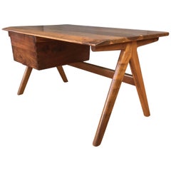 Bureau Jim Sweeny en palissandre et padauk à pieds de compas