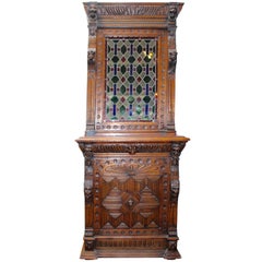 Late 19th Century Continental Carved Oak Cabinet With Stained Glass