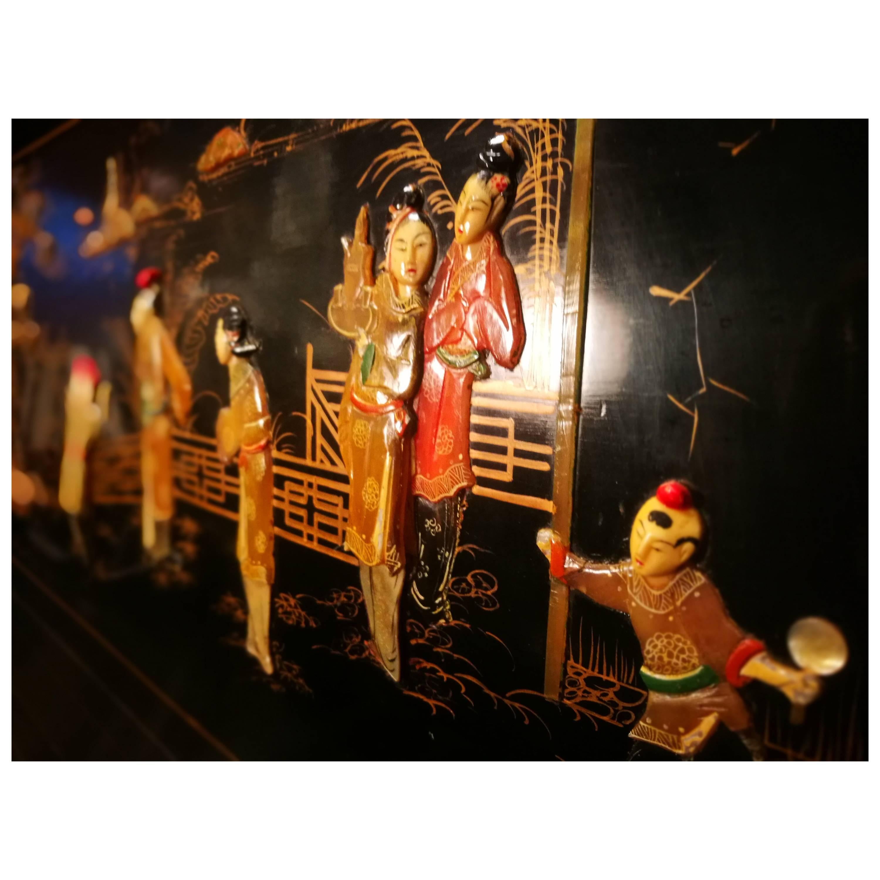 A early 19th century Chinese mahogany lacquer side cabinet, inlaid with soap stone, depicting classical Chinese scenes set on a lacquer background. 

A extremely chic buffet cabinet that opens to reveal a full bar! 

Two corner cabinets to hold