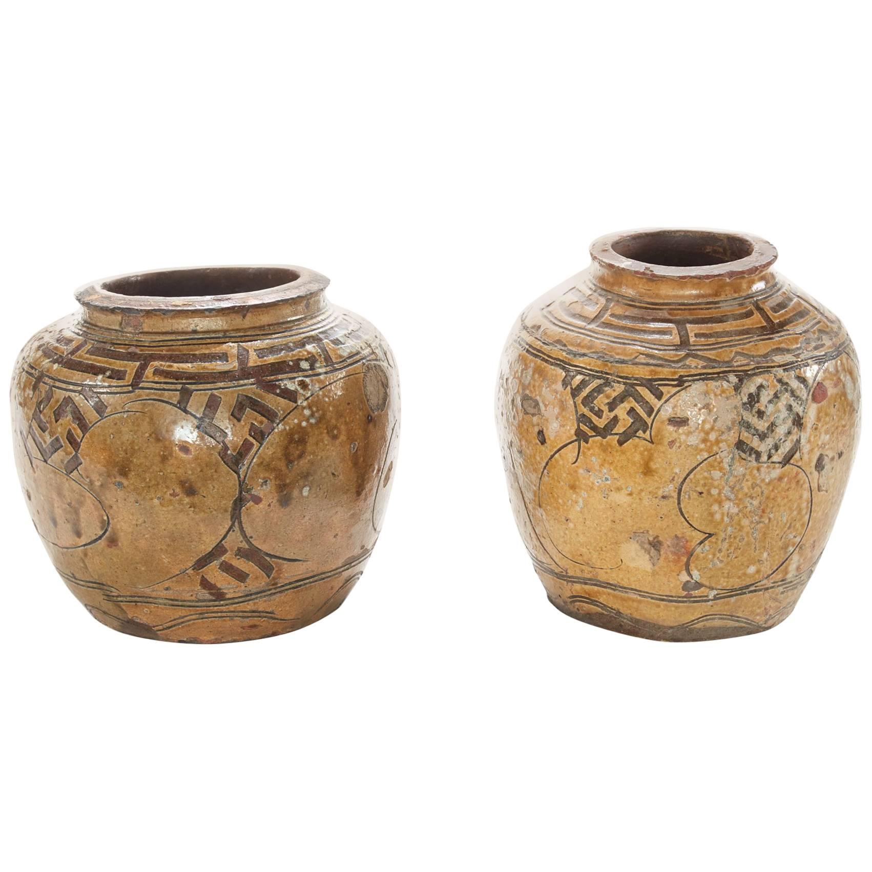 Two of a Pair of 19th Century Glazed Asian Pots