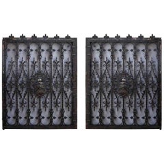 1880s Pair of Tudor Wrought Iron Window Guards with a Coat of Arms Center