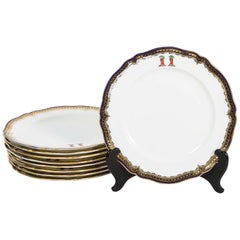 Nine Gilt Cobalt Border Dinner Plates with Crest