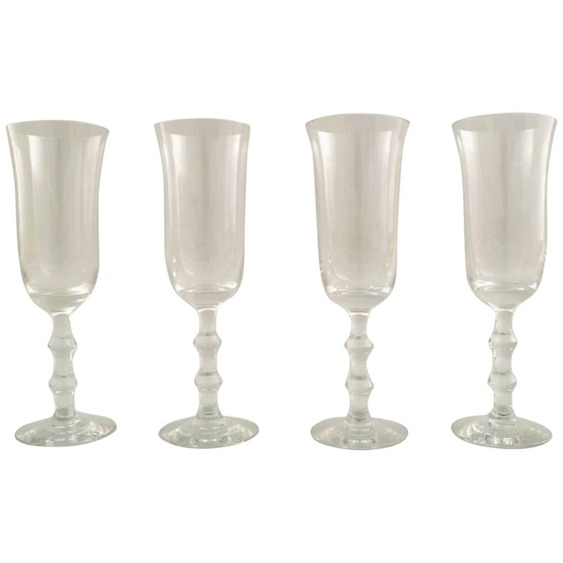 Simon Gate for Orrefors, a Set of Four Champagne Art Glasses