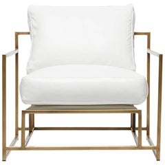 Fauteuil en cuir blanc et laiton antique