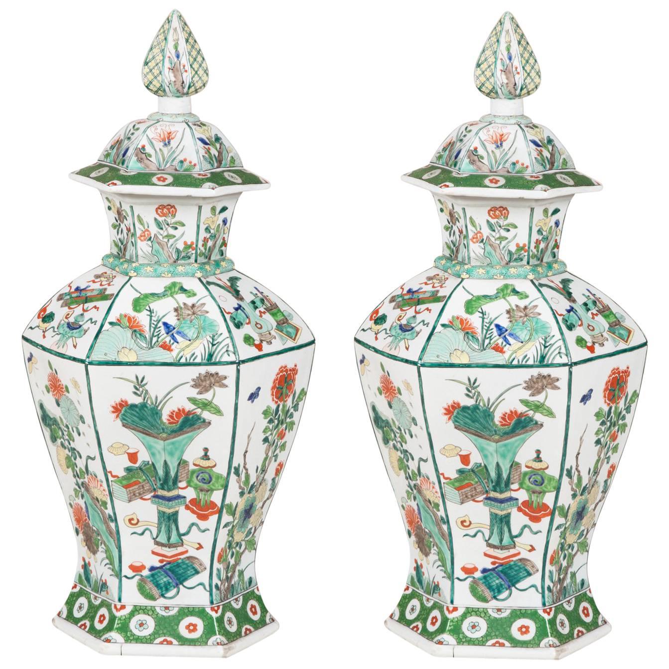 Pair of Famille Verte Facetted Baluster Vases and Covers For Sale