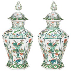 Pair of Famille Verte Facetted Baluster Vases and Covers