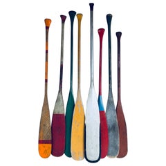 Collection of Eight Used Wooden Canoe Paddles with Original Painted Surfaces