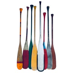 Collection of Eight Antique Wooden Canoe Paddles with Original Painted Surfaces