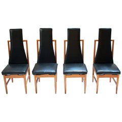 Set of Four Danish Modern Teak and Black Vinyl Tall-Back Dining Chairs