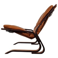 fauteuil norvégien Oddvin Rykken en bois de rose et cuir:: 1970