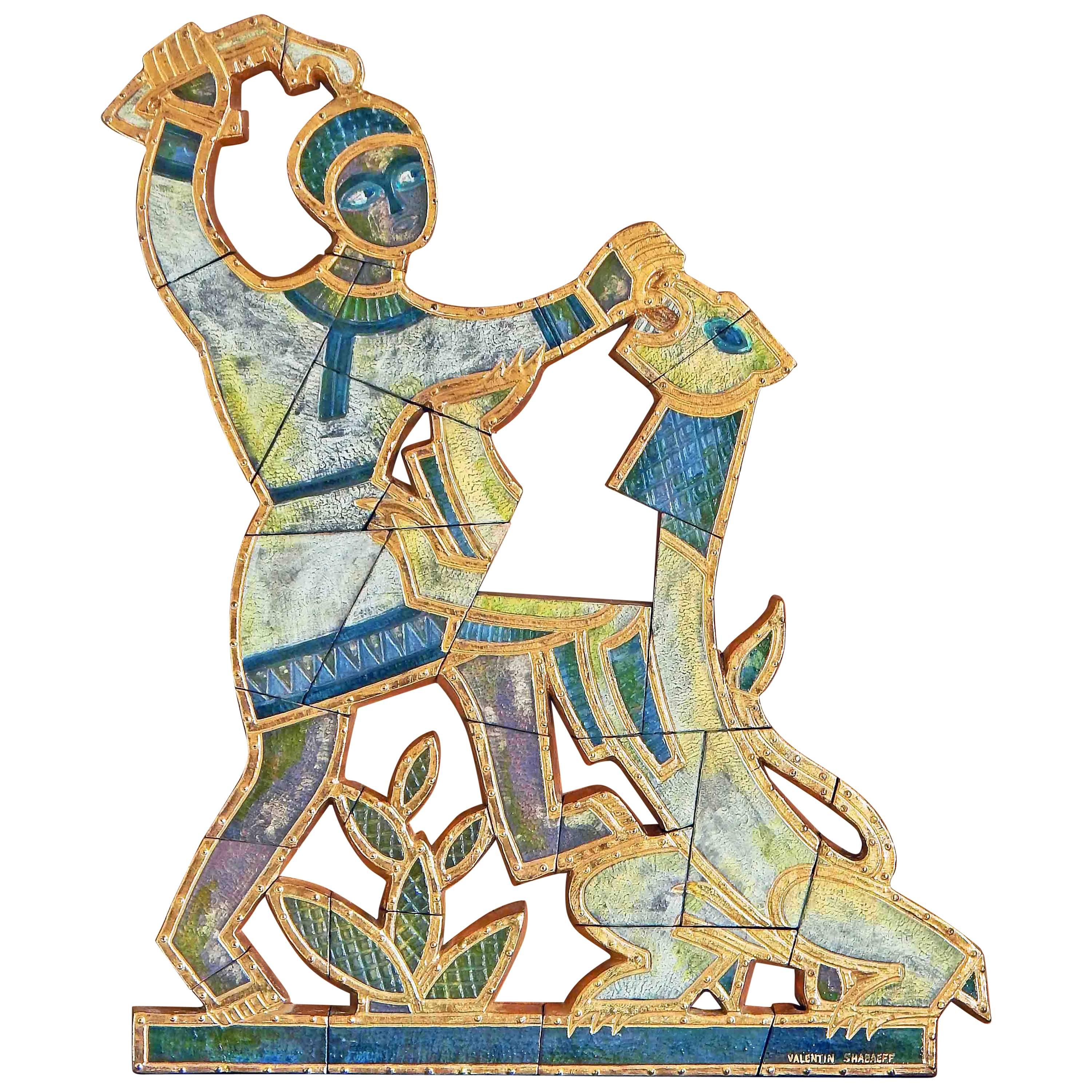 A tour de force example of Art Deco wall sculpture, this depiction of Samson slaying the lion was made by Valentin Shabaeff, a Russian-Canadian artist who settled in Montreal. Shabaeff became known for bas relief sculptures executed in ceramic,