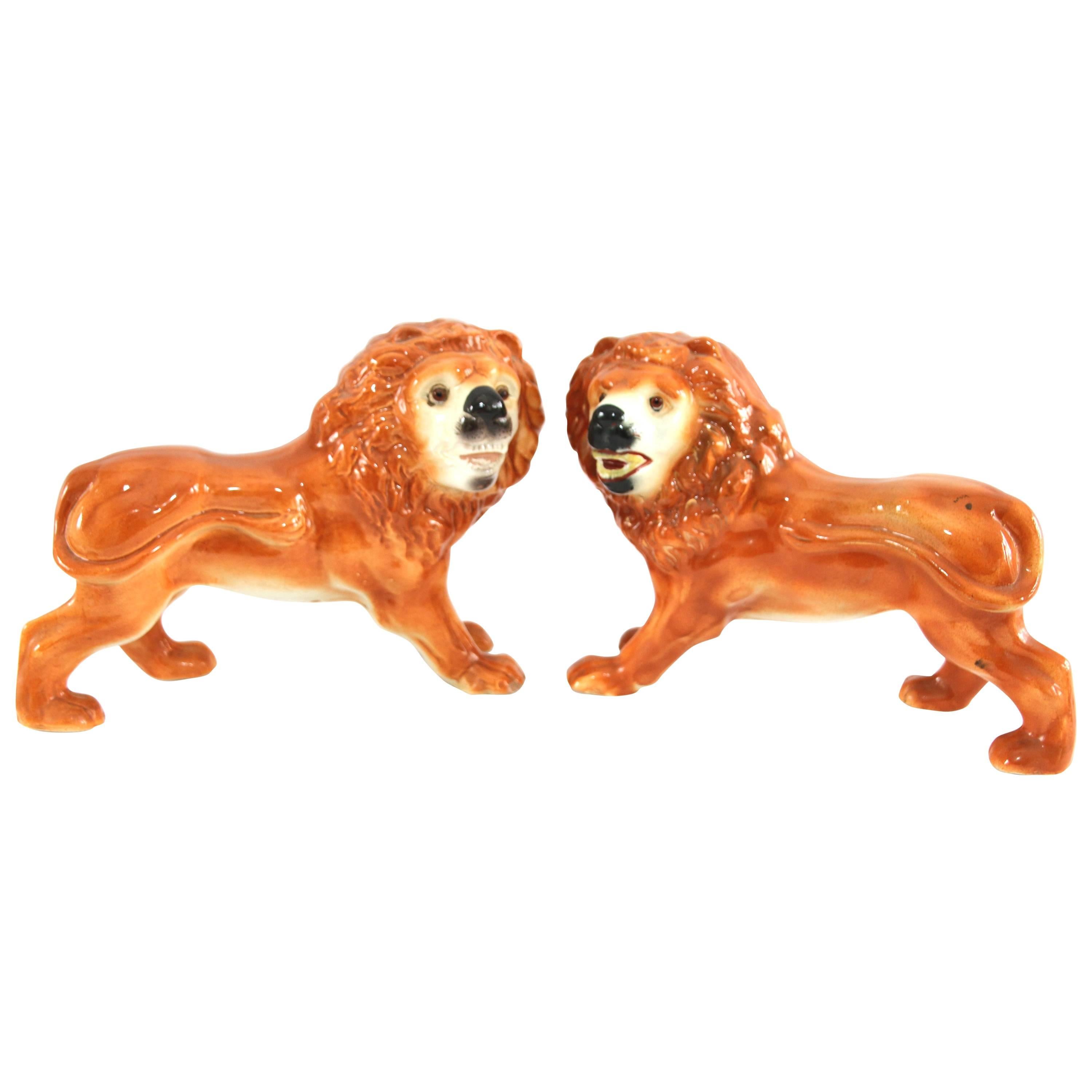 Pair of 19th Century Regal Staffordshire Opposing Lions