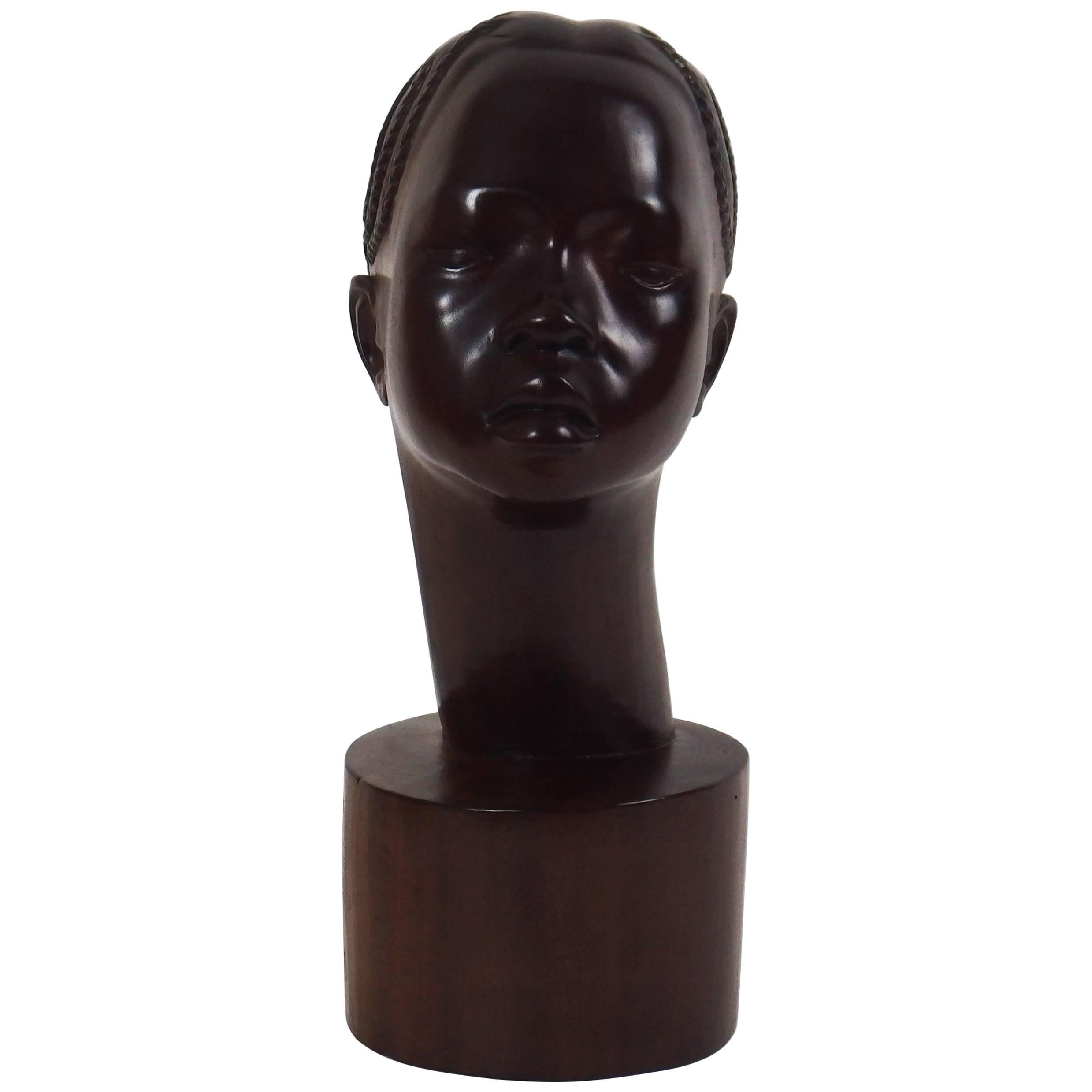 Carved Wood Sculpture of a Woman Head by Rakotondrabé For Sale