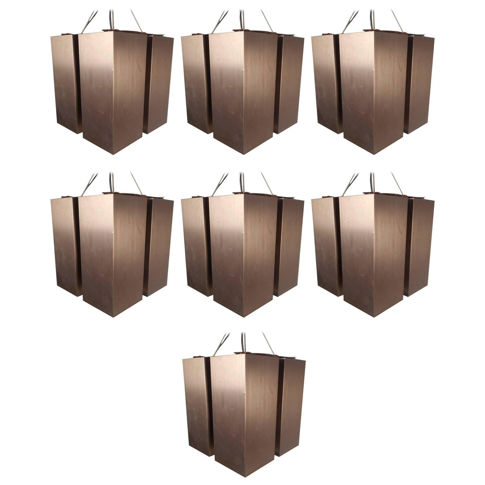 Unique Set of Seven Mid-Century Modern Hanging Brass Chandeliers