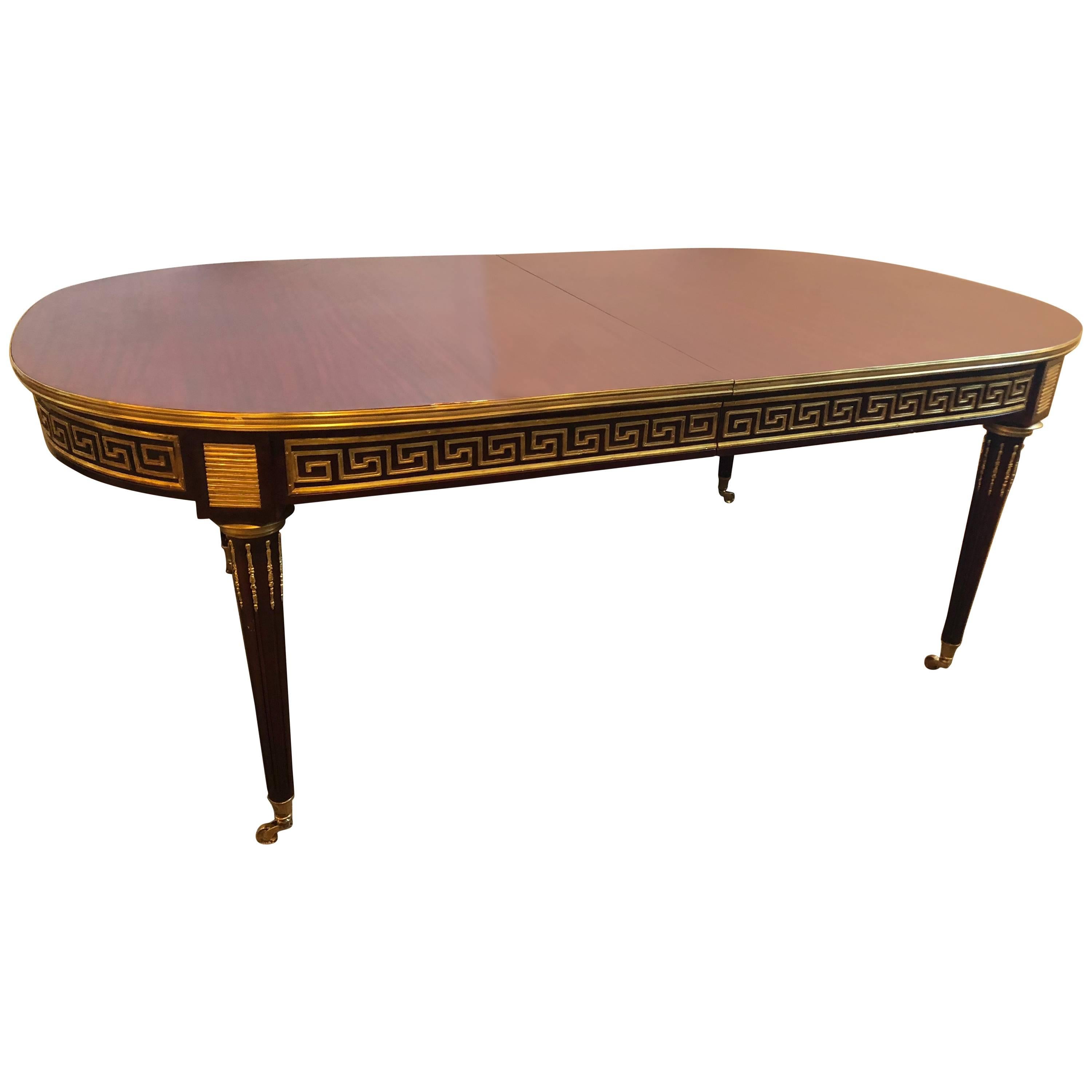 Mahogany Jansen Manner Louis XVI Style Dining Table with Bronze Greek Key Design