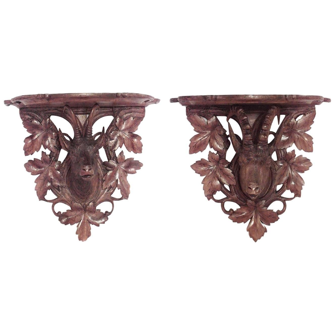 Pair of Black Forest Walnut Wall Shelves