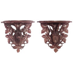 Antique Pair of Black Forest Walnut Wall Shelves
