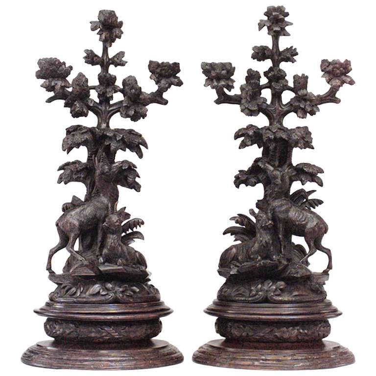 Pair of Rustic Black Forest Carved Walnut Candelabras For Sale