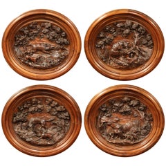 Four 19th Century French Hand-Carved Walnut Black Forest Oval Hunting Plaques